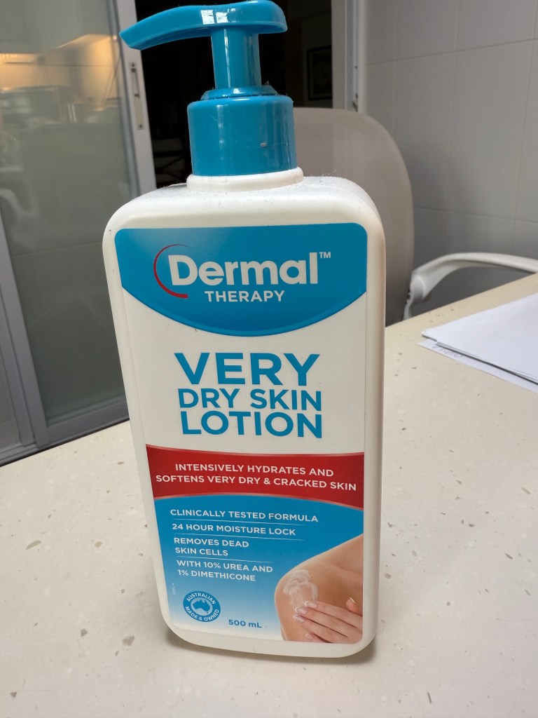 A bottle of Dermal Therapy Very Dry Skin Lotion, designed for intensive hydration and softening of very dry and cracked skin, featuring a pump dispenser and a label highlighting its clinical testing and moisturizing properties.