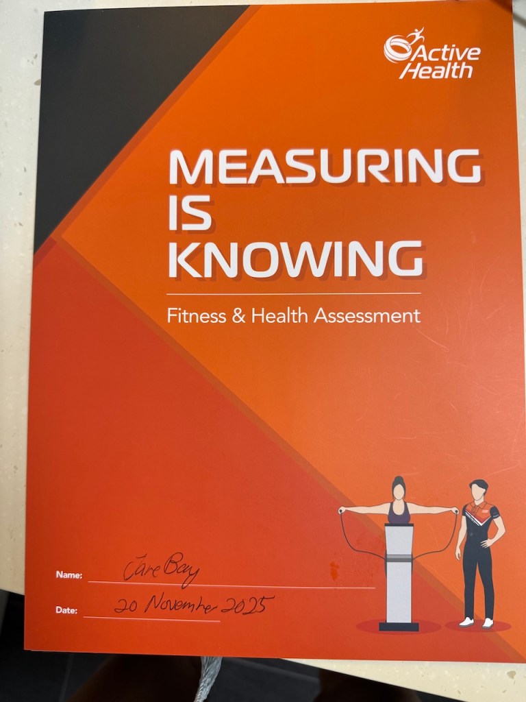 Active Health Singapore 'Measuring is Knowing' fitness and health assessment folder with handwritten date.