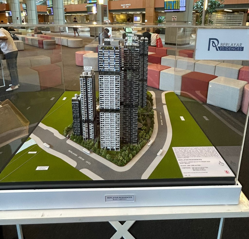 Official external architectural rendering of Berlayar Residences, a modern biophilic housing development in Singapore surrounded by lush tropical trees and parks.