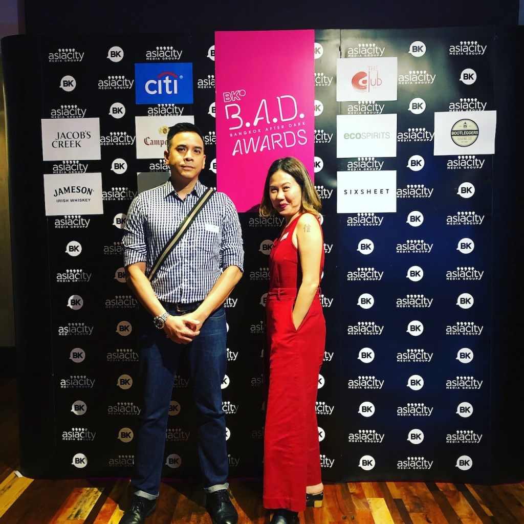 Ageisano creator leading an energetic and fun corporate workshop event on stage in Bangkok.